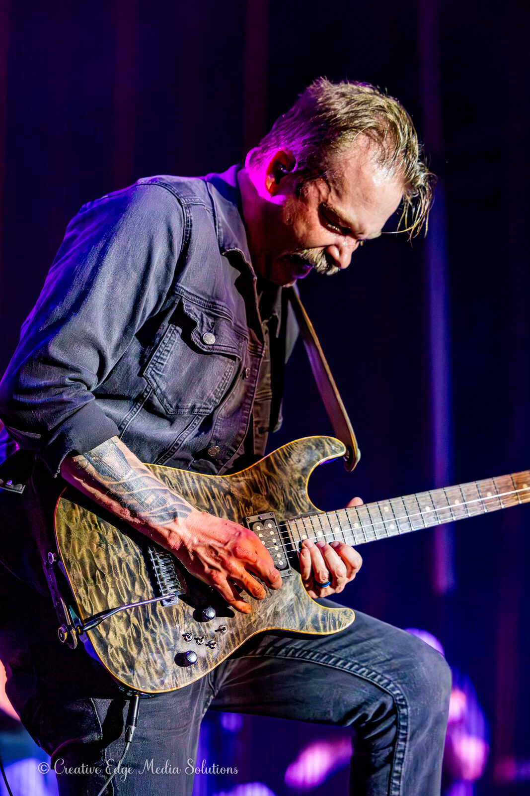 Guitarist close-up on stage